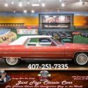 Burgundy Metallic Cadillac DeVille with 13,242 Miles available now!