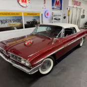 Burgundy/Maroon Pontiac Bonneville with 10,452 Miles available now!