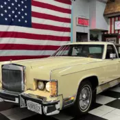 Butter Lincoln Town Car with 31000 Miles available now!