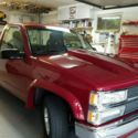 Cherry Red 94. Rebuilt, 440 plus horsepower & 6 speed transmission.