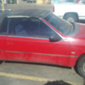 cherry red convertible coupe 3.0 liter V6 turbo engine.. Low Miles