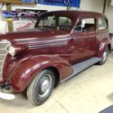 Chevrolet 1938 color Dark red , impeccable helmet, original, 2 door