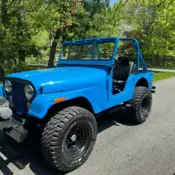 CJ5, 350-V8 ENGINE, 4X4 MANUAL TRANSMISSION WITH TAN RAG TOP.