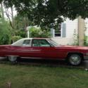 Classic 1974 Dynasty Red Cadillac DeVill, 2 door, rear wheel drive, garage kept