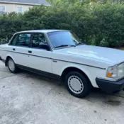 Classic 1989 Volvo 240 DL in white with blue interior — eye catching Beauty!