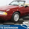 classic FoMoCo  red burgundy beige interior manual transmission drop top stang