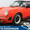 classic vintage air cooled Guards Red black leather interior German sports car