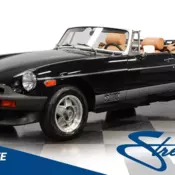 classic vintage British compact sports car drop rag top manual transmission chro