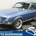 classic vintage chrome pony blue black interior restored FoMoCo Hurst Edelbrock
