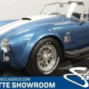 classic vintage chrome white racing stripes side pipes Smiths gauges