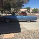 Clean 1969 Buick Electra 225 blue, with blue interior, and white convertible