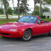 Clean CarFax, A/C, New convertible top, Newer Interior, Cool Ride! Good MPG.