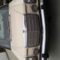 collectible beige color 4 door with sun roof