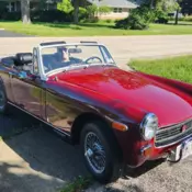 Extremely Nice Damask Red MG Midget with wire wheels and mint black interior