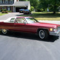 FANTASTIC 1975 CADILLAC COUPE DEVILLE RED, WHITE TOP, WHITE LEATHER. 32k MILES