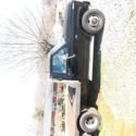 Ford F350 Black flatbed truck VIN:1FTJF3517GNB28996