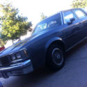 Gray Oldsmobile Cutlass Base Sedan 4-Door