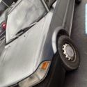 Gray Toyota Corolla 1990
