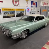 Green Cadillac DeVille with 47,447 Miles available now!