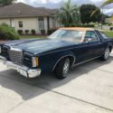 his is a Classic. Navy blue with tan cloth interior. Very clean throughout. Exce