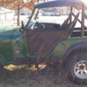 Jeep CJ 7  1974 3 spd, bikini top, half doors.  Runs great, 304 V8, good tires.