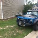 Jeep Comanche Pickup 4x4  Blue and Black mud truck custom