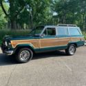 Last year of the Jeep Grand Wagoner in the rare hunter green!