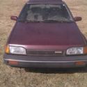 Mazda 323. NO RESERVE.  RAN PRIOR TO STORAGE