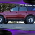 Medium Red Pearl Toyota Land Cruiser with 89,599 Miles available now!