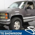modern classic Chevy SUV bull bar 4 wheel drive cloth interior bucket seats
