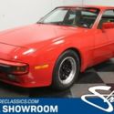 modern classic chrome sports car 2.5 liter 4 cylinder 5 speed manual red