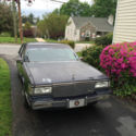 Navy Blue exterior with Burgundy leather interior.  37,000 original miles