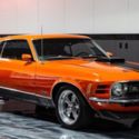 Perfect shade of Calypso Coral, 408 Stroker, 5 speed manual.