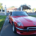 Red 1973  Datsun  240 Z, 5speed manual ,runs and shifts smoothly. head turner.