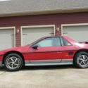 Red 1985 Pontiac Fiero  2.8L V6 4 Speed Manual