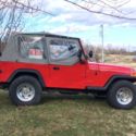 Red 1989 Jeep YJ