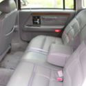 Red 1994 Lincoln Continental Signature 4 door sedan