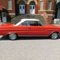 Red and White 1965 Mercury Comet Cyclone V-8