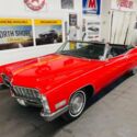 Red Cadillac DeVille with 49,651 Miles available now!