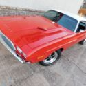 Red Dodge Challenger with 99,999,999 Miles available now!