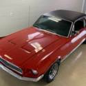 Red Ford Mustang with 56000 Miles available now!