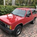 Red GMC Jimmy with 67,000 Miles available now!
