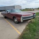 Red LeBaron wirh Black Vinyl Top and Black Interior