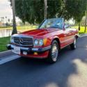 Red Mercedes-Benz 560 SL Series with 143,858 Miles available now!