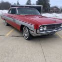 Red Oldsmobile Starfire with 0 Miles available now!