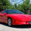 Red Pontiac Firebird with 64,431 Miles available now!
