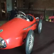 Red Racer Pedal Car meant to  mimic a mid 50s Ferrari racer