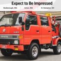 Red Toyota HiAce at AlphaCars of Acton