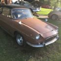 renault its a convertible with removeable metal top, along with rag top also.