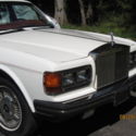 ROLLS ROYCE WHITE SILVER SPIRIT WITH RED LEATHER.